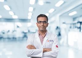 Dr Vikram Dalvi